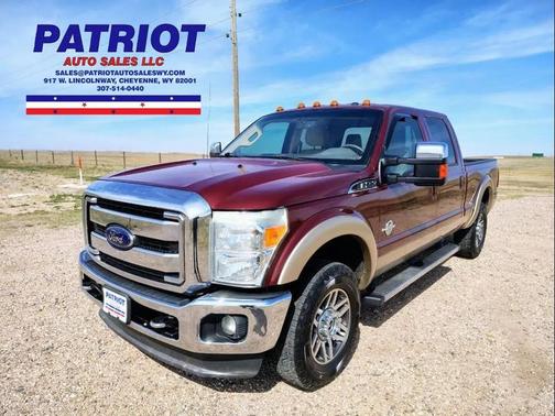 Red 2012 Ford F-250 Lariat