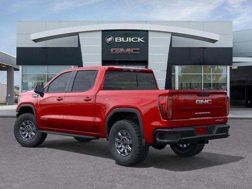 Volcanic Red Tintcoat 2026 GMC Sierra 1500 AT4X