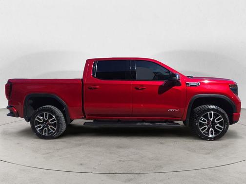Volcanic Red Tintcoat 2025 GMC Sierra 1500 AT4