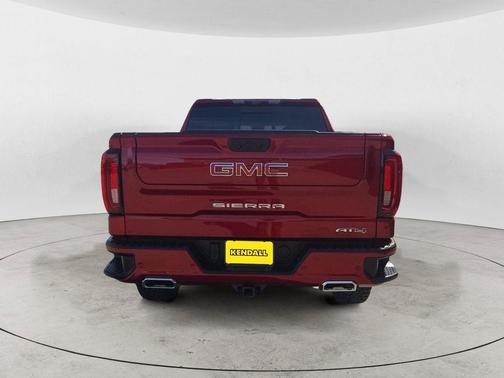 Volcanic Red Tintcoat 2025 GMC Sierra 1500 AT4