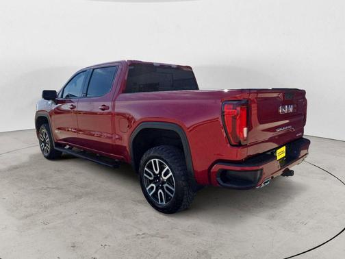 Volcanic Red Tintcoat 2025 GMC Sierra 1500 AT4