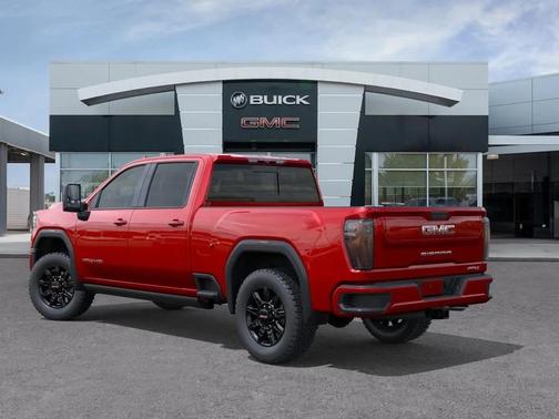 Volcanic Red Tintcoat 2026 GMC Sierra 2500 AT4