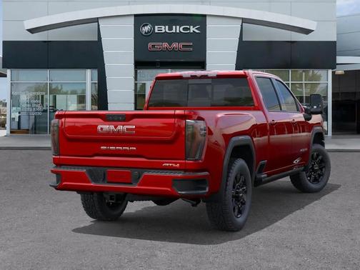 Volcanic Red Tintcoat 2026 GMC Sierra 2500 AT4