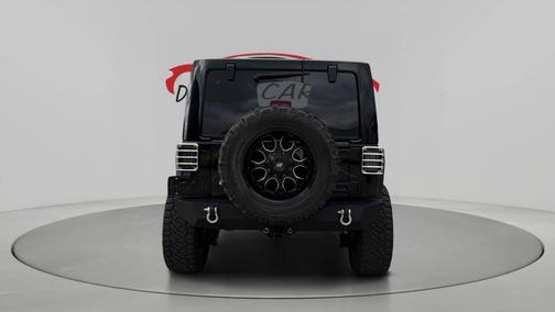 Black 2012 Jeep Wrangler Unlimited Sahara