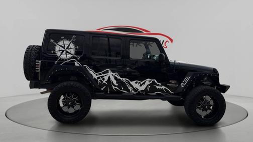 Black 2012 Jeep Wrangler Unlimited Sahara