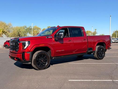 Volcanic Red Tintcoat 2025 GMC Sierra 2500 AT4