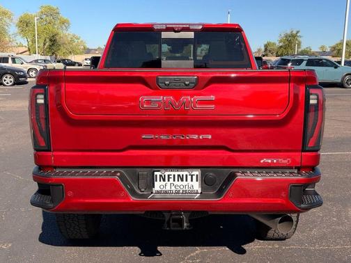 Volcanic Red Tintcoat 2025 GMC Sierra 2500 AT4