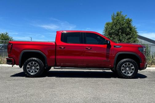Volcanic Red Tintcoat 2024 GMC Sierra 1500 AT4