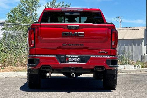 Volcanic Red Tintcoat 2024 GMC Sierra 1500 AT4