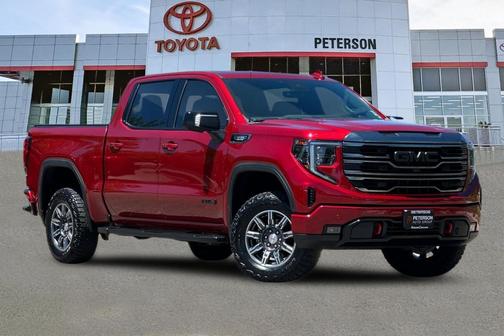 Volcanic Red Tintcoat 2024 GMC Sierra 1500 AT4