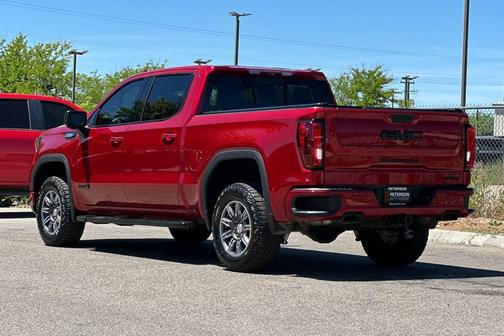 Volcanic Red Tintcoat 2024 GMC Sierra 1500 AT4
