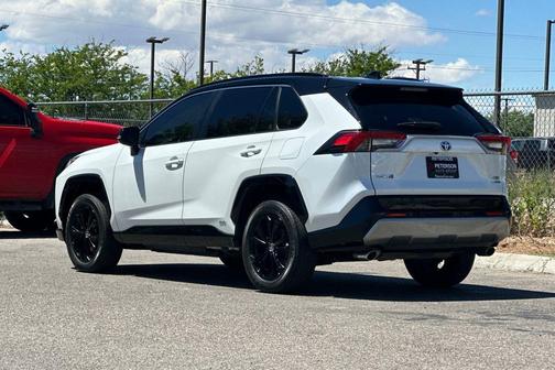 Wind Chill Pearl/Midnight Black Metallic 2023 Toyota RAV4 Hybrid SE