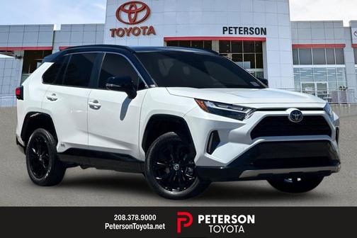 Wind Chill Pearl/Midnight Black Metallic 2023 Toyota RAV4 Hybrid SE