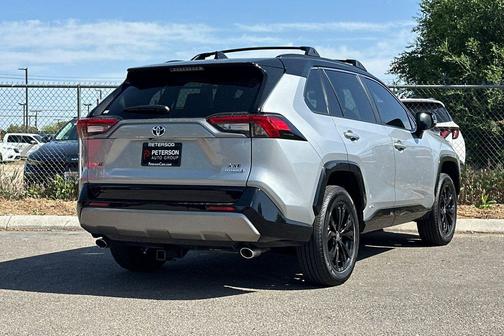 Silver Sky Metallic/Midnight Black Metallic 2024 Toyota RAV4 Hybrid SE