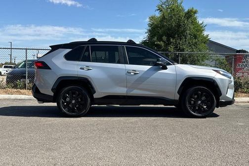 Silver Sky Metallic/Midnight Black Metallic 2024 Toyota RAV4 Hybrid SE