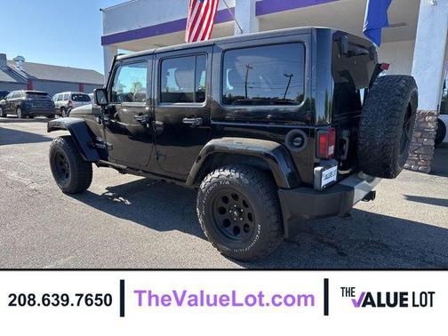 Black Clearcoat 2011 Jeep Wrangler Unlimited Sahara
