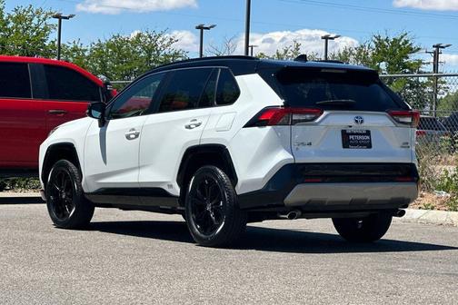 Wind Chill Pearl/Midnight Black Metallic 2023 Toyota RAV4 Hybrid SE