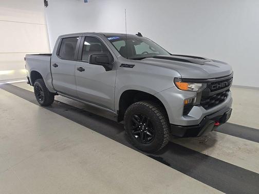 Sterling Gray Metallic 2024 Chevrolet Silverado 1500 4WD Crew Cab 147" Custom Trail Boss