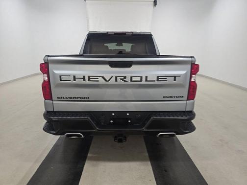 Sterling Gray Metallic 2024 Chevrolet Silverado 1500 4WD Crew Cab 147" Custom Trail Boss