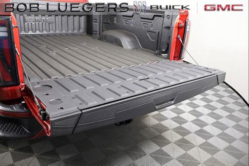 Volcanic Red Tintcoat 2026 GMC Sierra 2500 AT4
