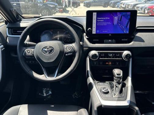 Magnetic Gray Metallic/Midnight Black Metallic 2024 Toyota RAV4 Hybrid SE