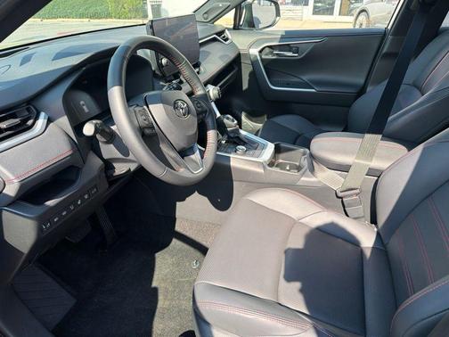 Magnetic Gray Metallic/Midnight Black Metallic 2025 Toyota RAV4 Hybrid SE