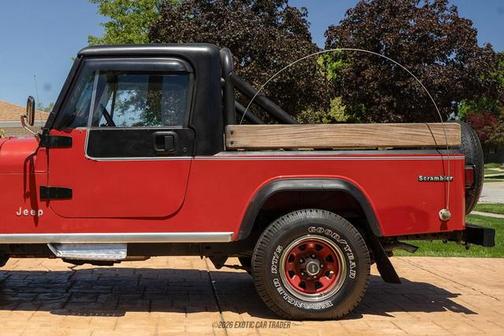 Red 1985 Jeep Scrambler