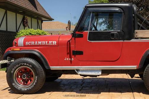 Red 1985 Jeep Scrambler