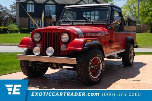 Red 1985 Jeep Scrambler