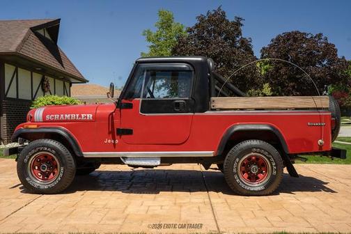 Red 1985 Jeep Scrambler