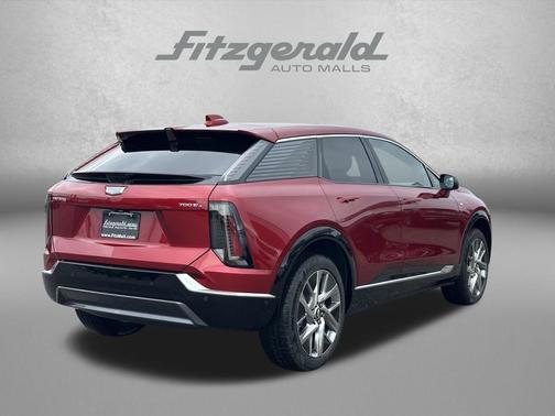 Radiant Red Tintcoat 2026 Cadillac OPTIQ Luxury