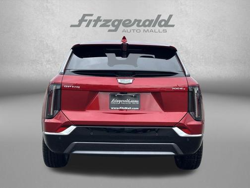 Radiant Red Tintcoat 2026 Cadillac OPTIQ Luxury