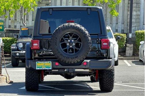 Black 2026 Jeep Wrangler Sport