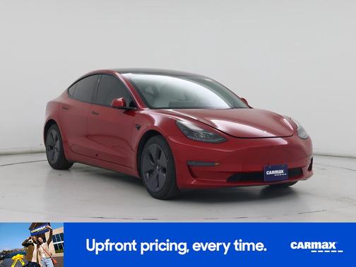 Red 2023 Tesla Model 3