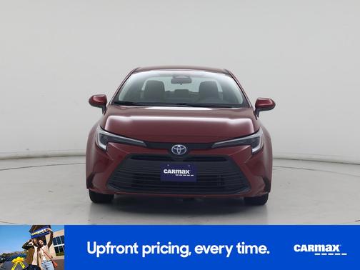 Red 2025 Toyota Corolla Hybrid LE