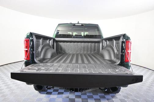 Serrano Green Metallic 2026 RAM 1500 RHO Crew Cab 4x4 5'7' Box