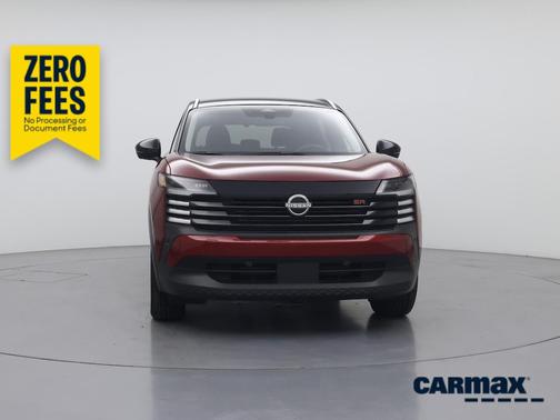 Red 2025 Nissan Kicks SR