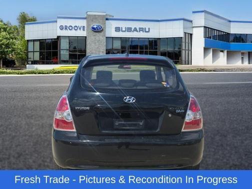 Ebony Black 2010 Hyundai Accent Blue