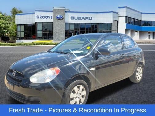 Ebony Black 2010 Hyundai Accent Blue
