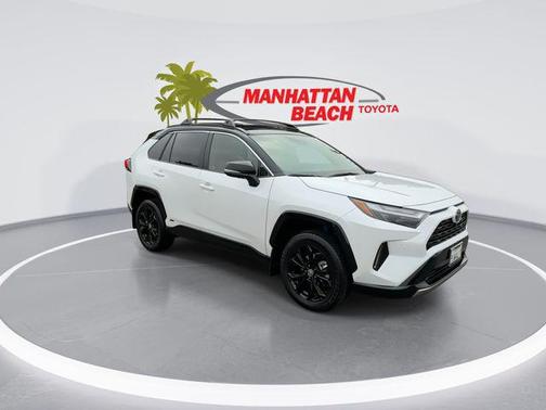 Wind Chill Pearl/Midnight Black Metallic 2024 Toyota RAV4 Hybrid SE