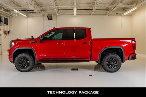 Volcanic Red Tintcoat 2024 GMC Sierra 1500 AT4