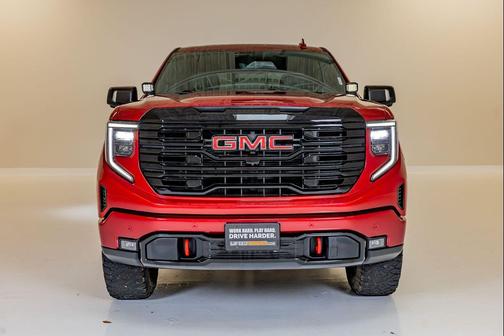Volcanic Red Tintcoat 2024 GMC Sierra 1500 AT4