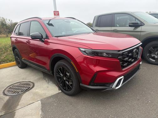 Radiant Red Metallic 2026 Honda CR-V Hybrid Sport Touring