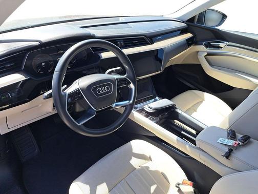 Madeira Brown Metallic 2024 Audi Q8 e-tron Premium Plus