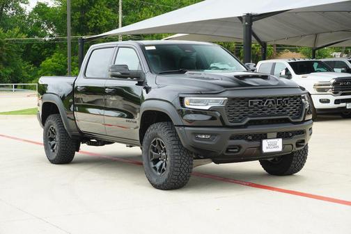 Diamond Black Crystal Pearlcoat 2026 RAM 1500 RHO Crew Cab 4x4 5'7' Box
