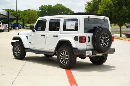 Bright White Clearcoat 2025 Jeep Wrangler 4-Door Sahara 4x4