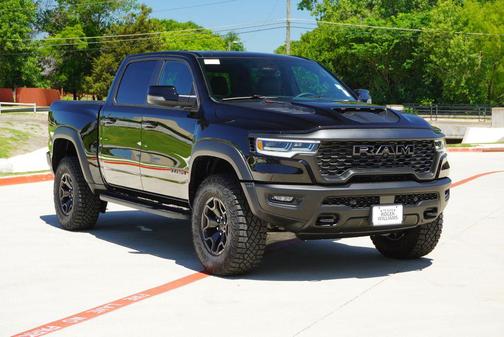 Diamond Black Crystal Pearlcoat 2026 RAM 1500 RHO Crew Cab 4x4 5'7' Box