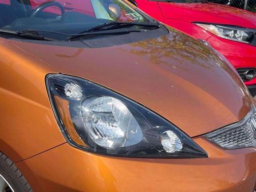 Orange Revolution Metallic 2011 Honda Fit Sport