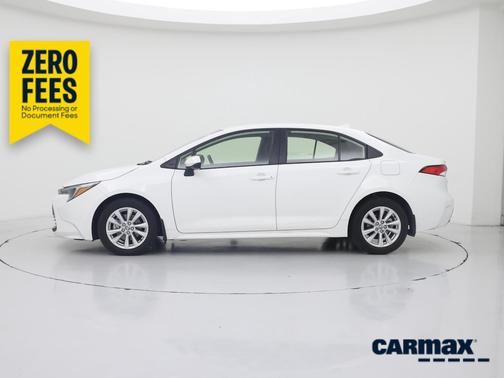White 2023 Toyota Corolla Hybrid LE