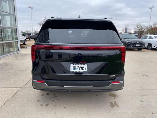 Aurora Black Pearl 2026 Kia Carnival Hybrid SX
